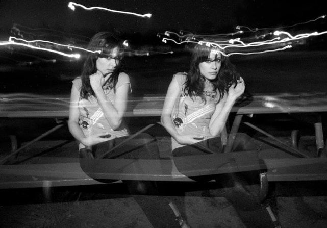 Lauren DiMarco on bench- detail